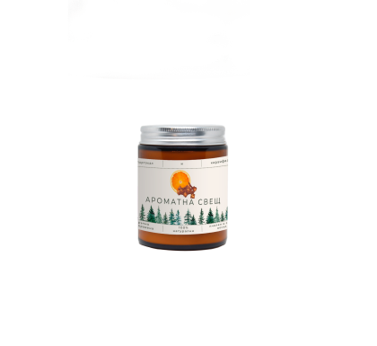 Orange and clove scented candle